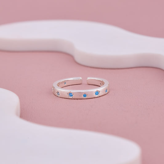 Silver Adjustable Band Ring with Blue Star Accents