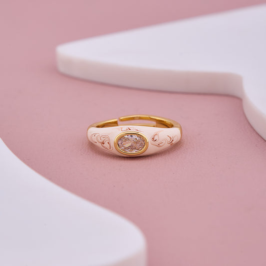 Gold-Plated Enamel Ring with Intricate Floral Engraving and Oval Crystal Centerpiece