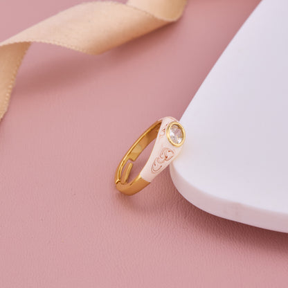 Gold-Plated Enamel Ring with Intricate Floral Engraving and Oval Crystal Centerpiece