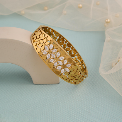 Elegant Gold Floral Cut-Out Bangle with Stone Embellishments