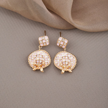Baby Pink Exquisitely Crafted Earrings Showcasing Intricate Design