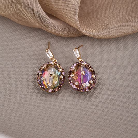 Elegant Gemstone Earrings with Intricate Detailing