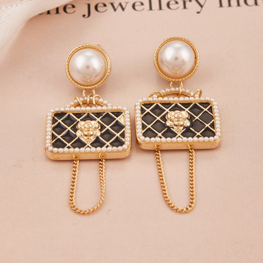 Pearl & Handbag-Inspired Drop Earrings with Chain and Floral Accent