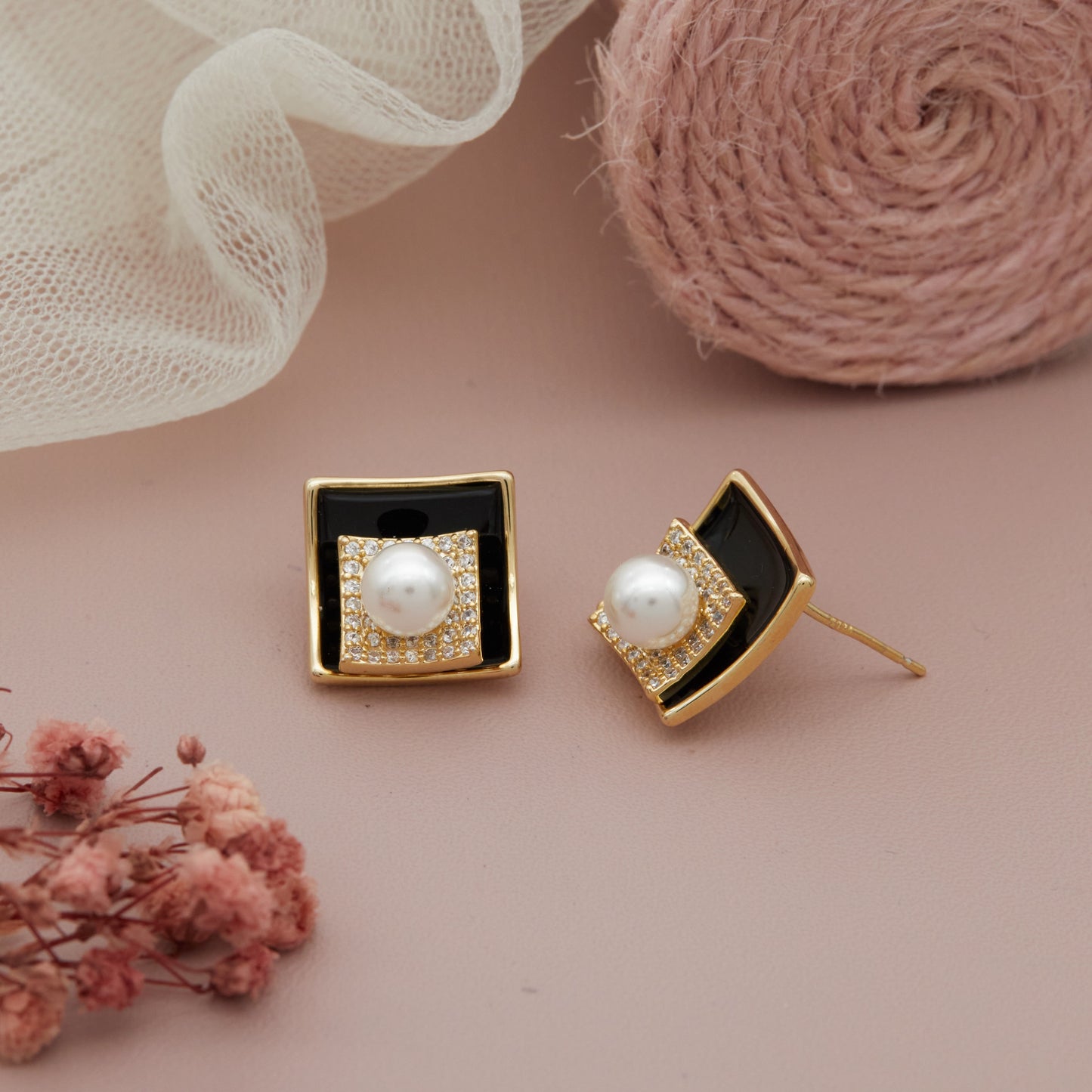 Pearl Earrings with Artistic Floral Setting – Elegant Accessory Display