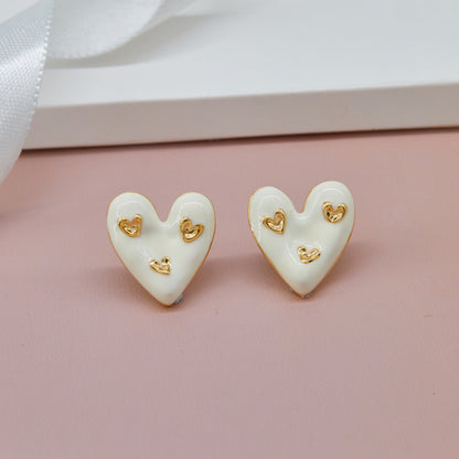 White Heart Earrings Playful Elegance & Charm