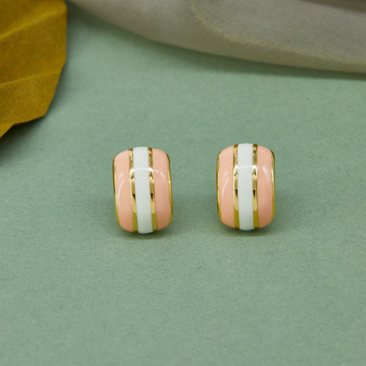 Elegant Earrings Highlighted on Vibrant Green