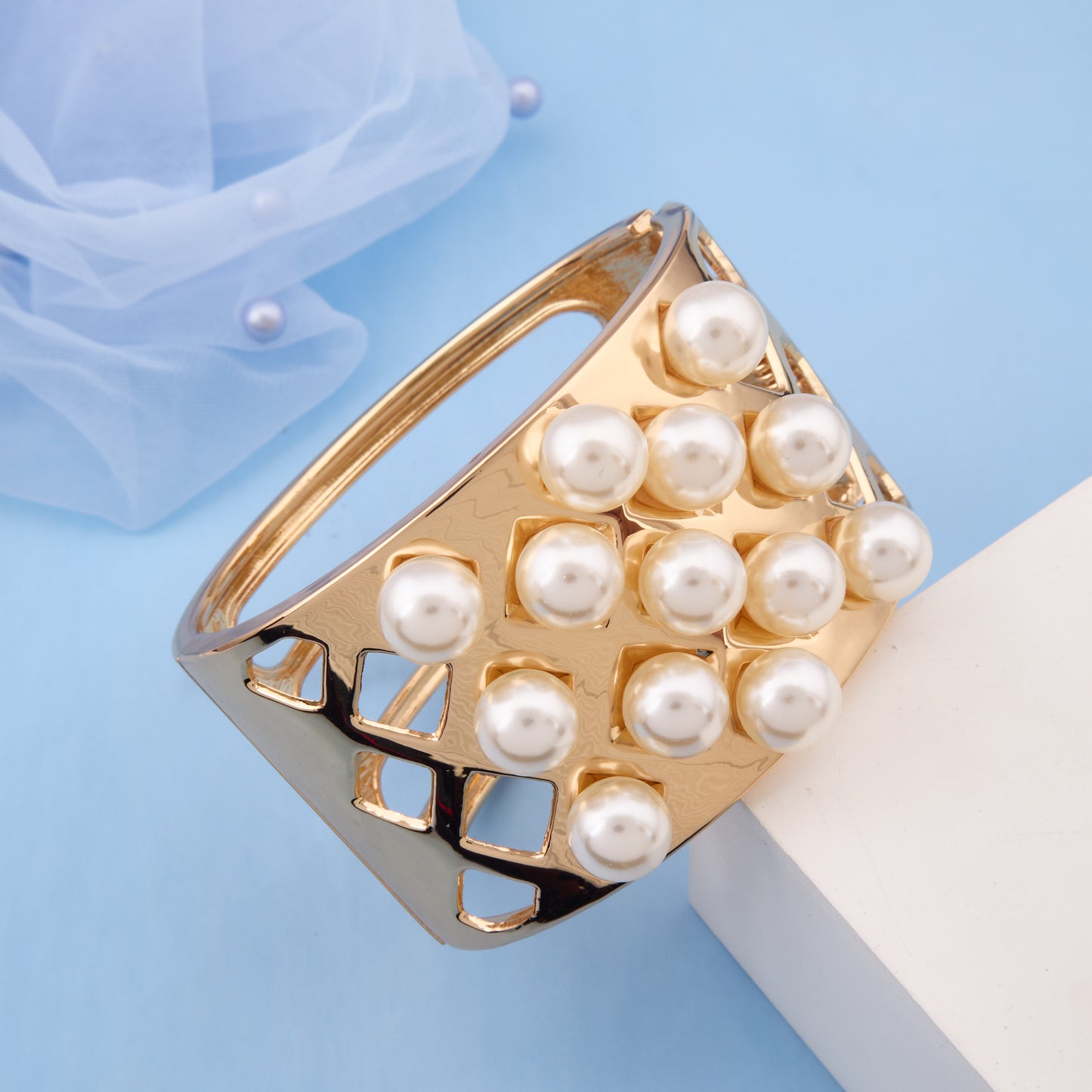 Gold-Tone Statement Bracelet with Pearl Embellishments