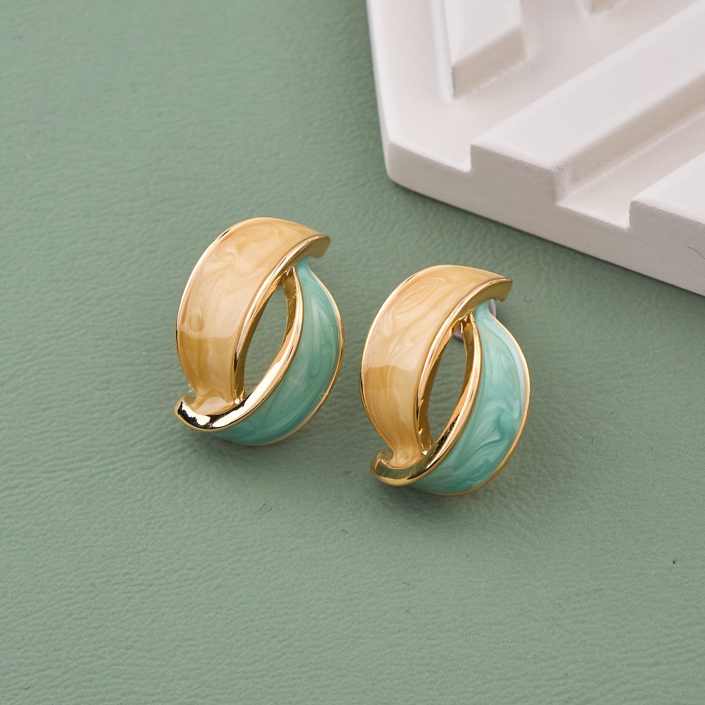 Elegant Earrings with Gemstone and Enamel Details