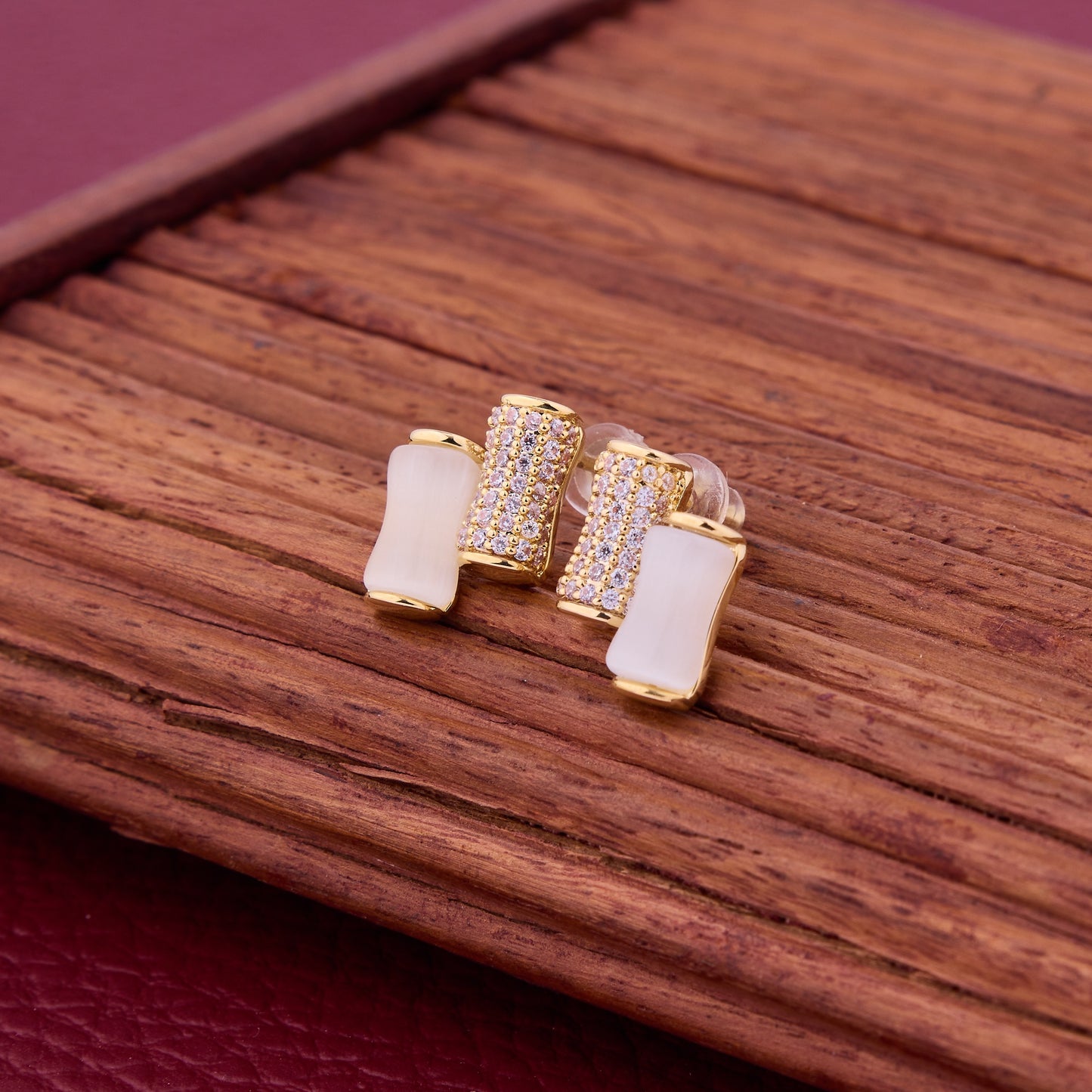 Elegant Gold Earrings with White Stones