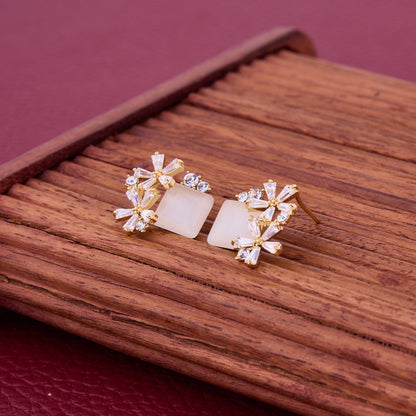 Elegant Diamond Earrings with Intricate Design