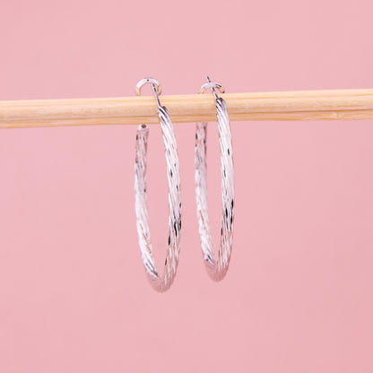 Radiant Diamond-Cut Silver Hoops