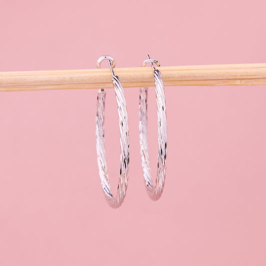 Radiant Diamond-Cut Silver Hoops