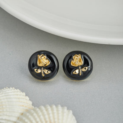 Black Earrings with Intricate Gold Floral Design Striking Elegance