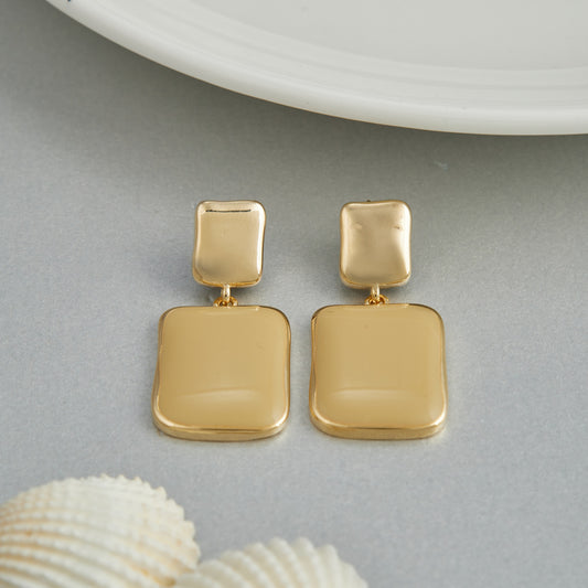 Gold Earrings Elegant Simplicity in a Minimal Setting