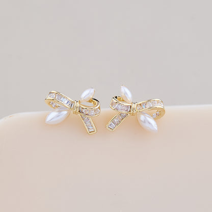 Elegant Pearl Bow Earrings with Crystal Detailing