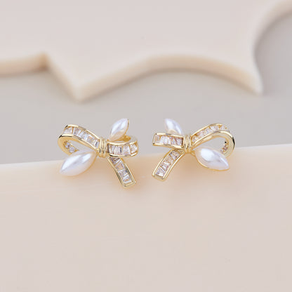 Elegant Pearl Bow Earrings with Crystal Detailing