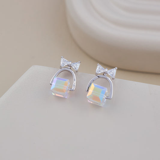 Silver Bow Earrings with Iridescent Cube Drop