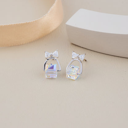 Silver Bow Earrings with Iridescent Cube Drop